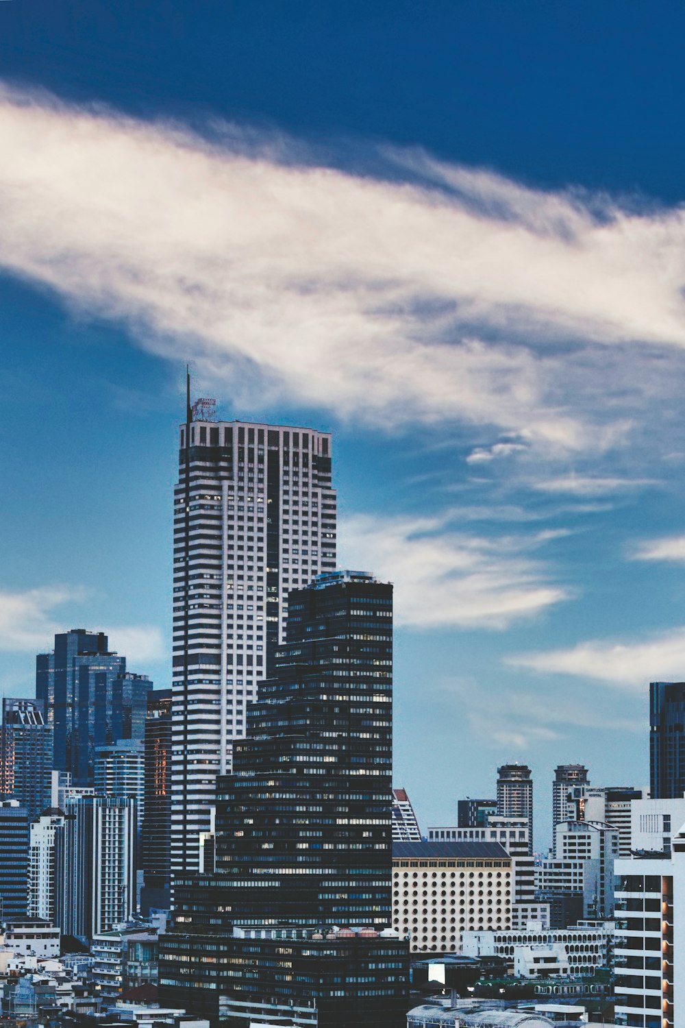 a view of a city with tall buildings