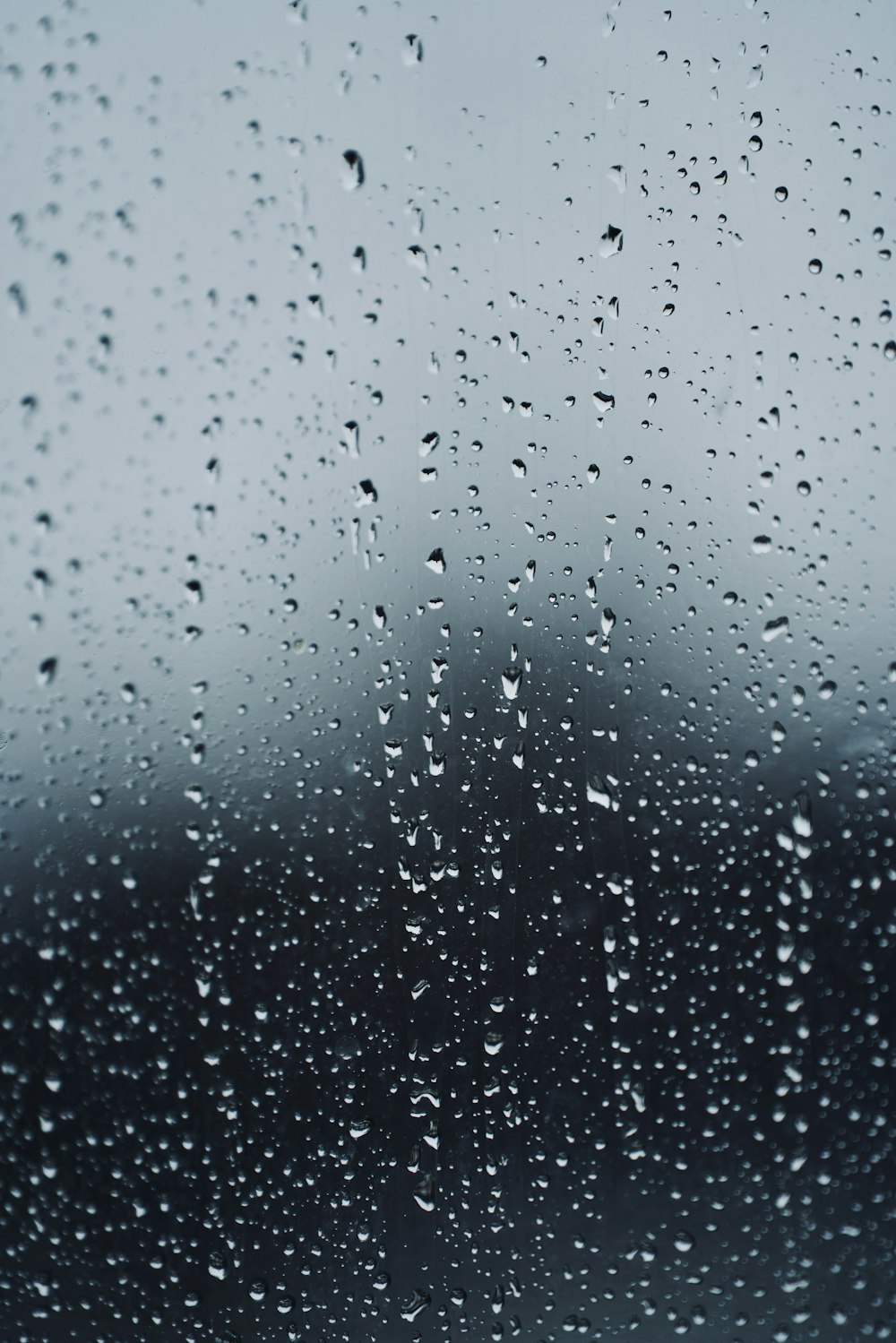 a window with rain drops on it