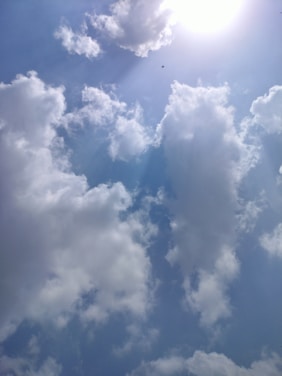 A serene image depicting light shining through clouds.