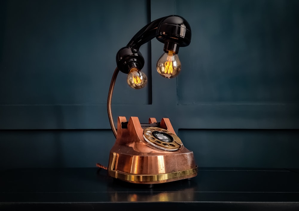 an old fashioned phone is sitting on a table