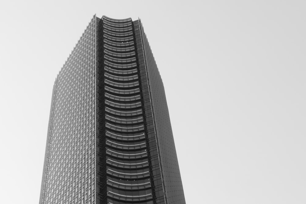 a black and white photo of a tall building