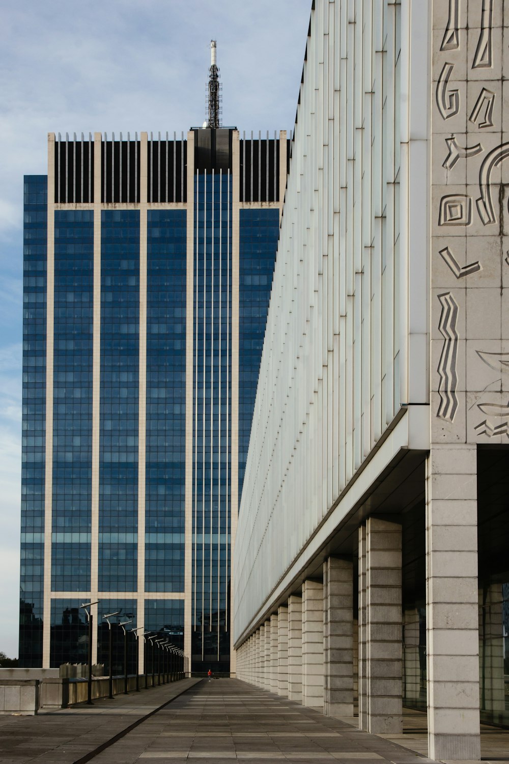 a tall building with writing on the side of it