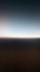 Wavy line graphic separating sections with a subtle gradient.