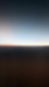 Wavy line graphic separating sections with a subtle gradient.