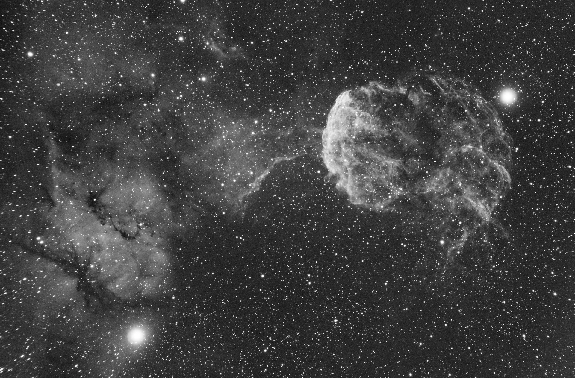 An elegant celestial map with intricate astrological symbols illuminated against a dark, luxurious background.