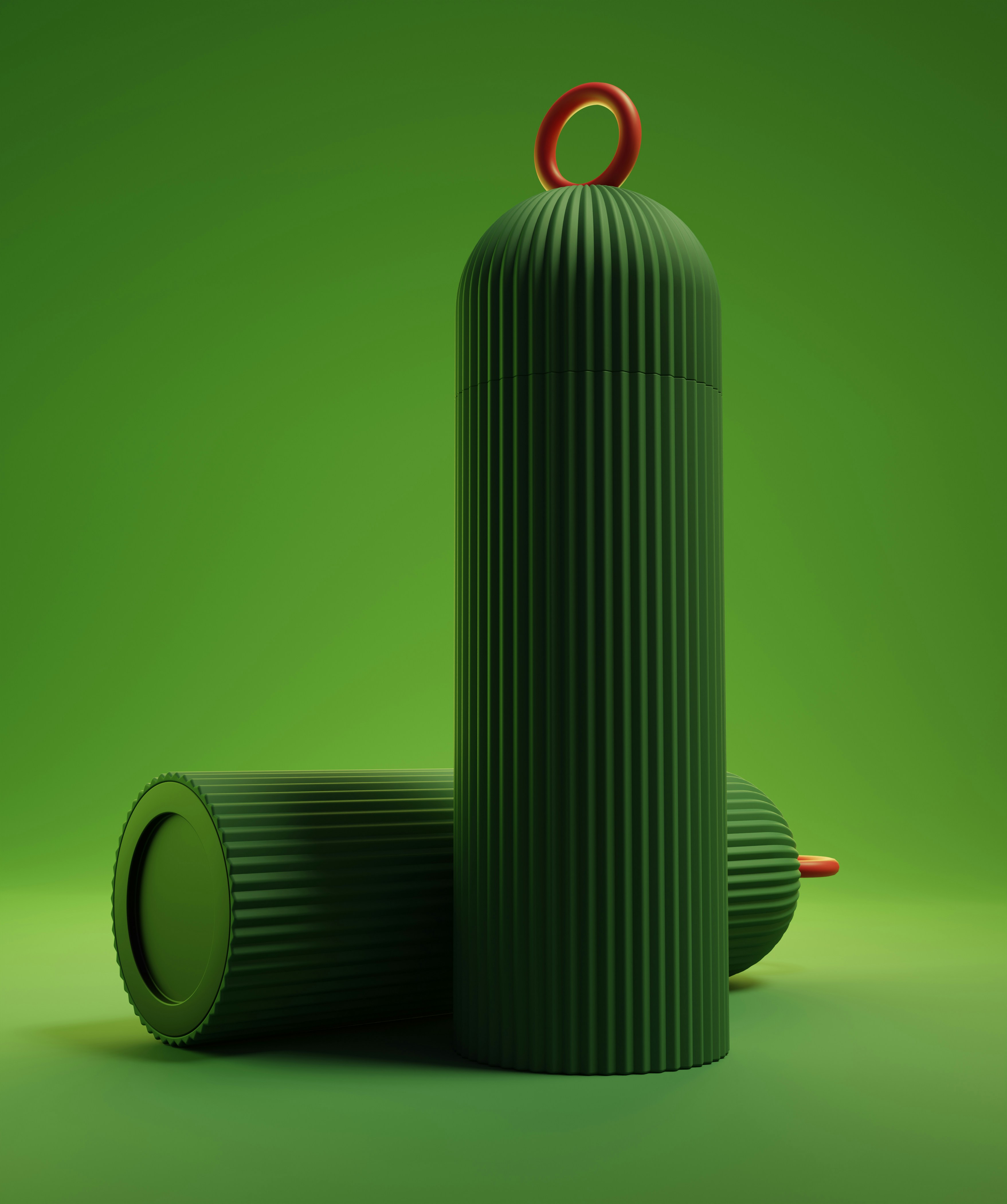 a green object with a red ring on top of it