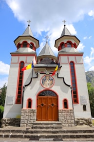 The stone-carved facade of the Trei Ierarhi Church in Iași.