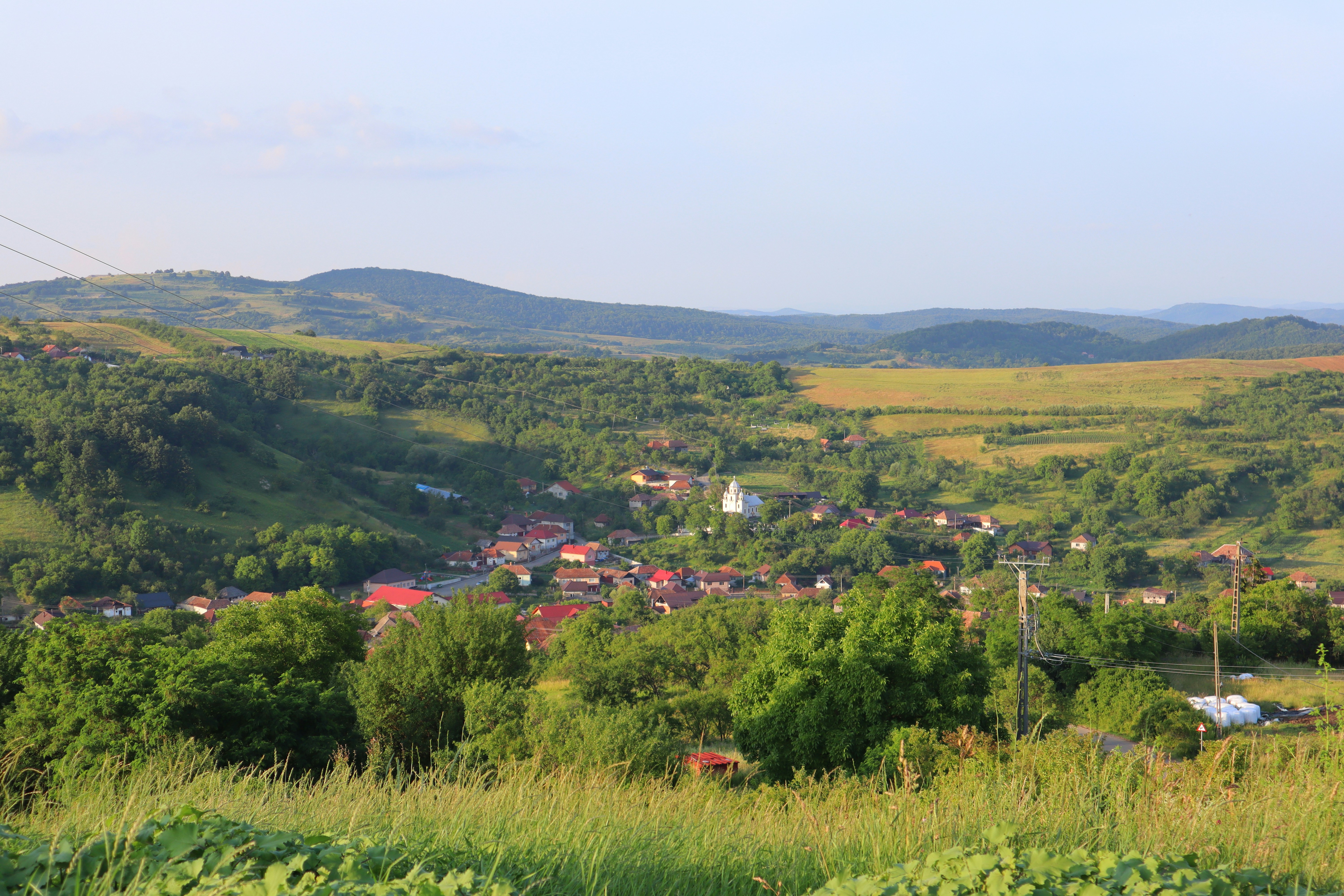 a view of a small village in the mountains