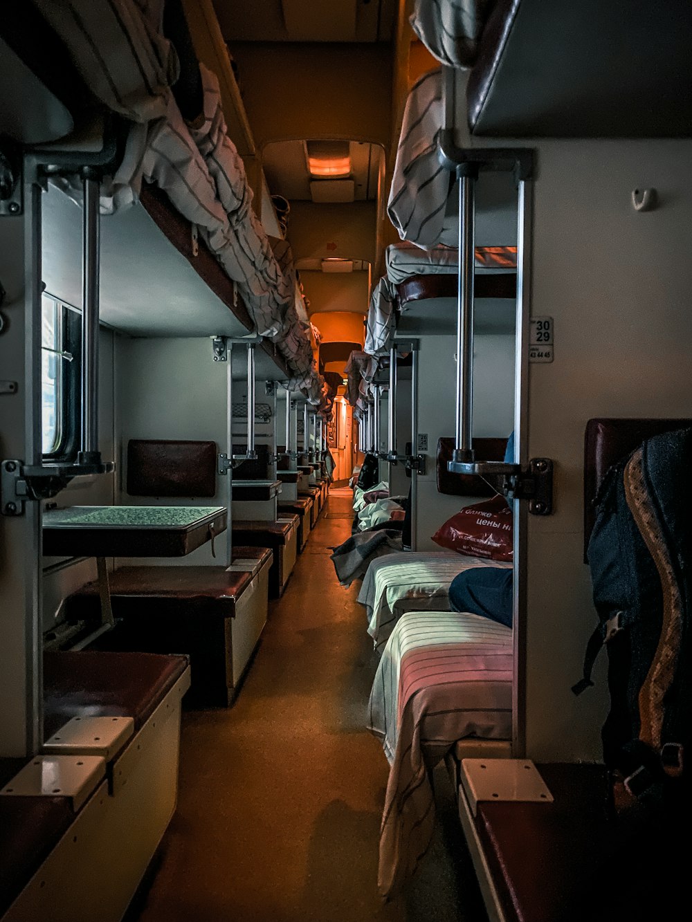 a row of beds sitting next to each other in a room