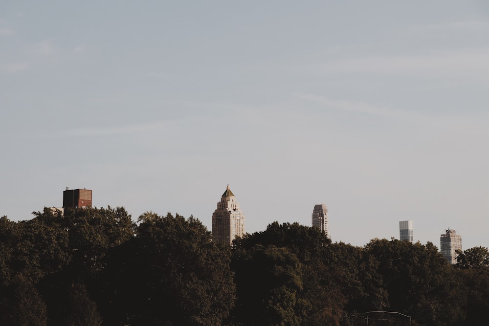 a view of a city with a clock tower in the distance