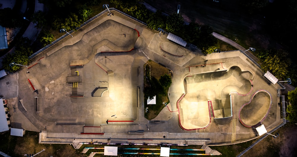 an aerial view of a skate park at night