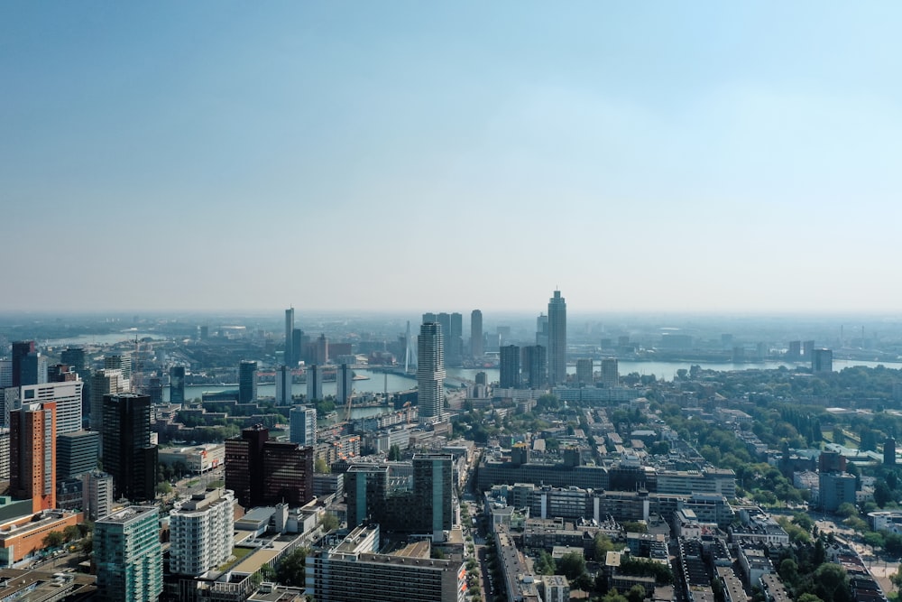 an aerial view of a city with tall buildings