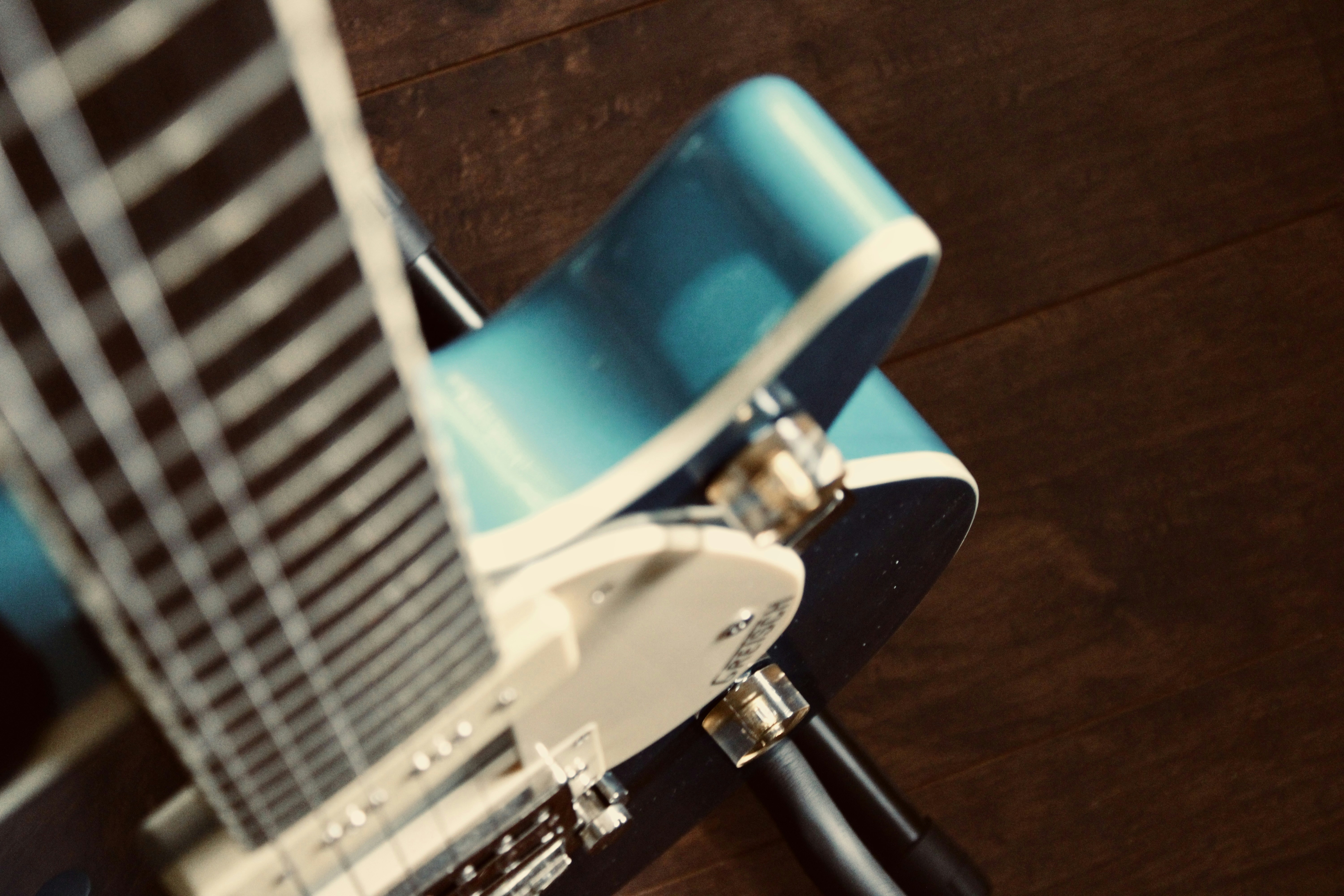 a close up of a blue and white chair