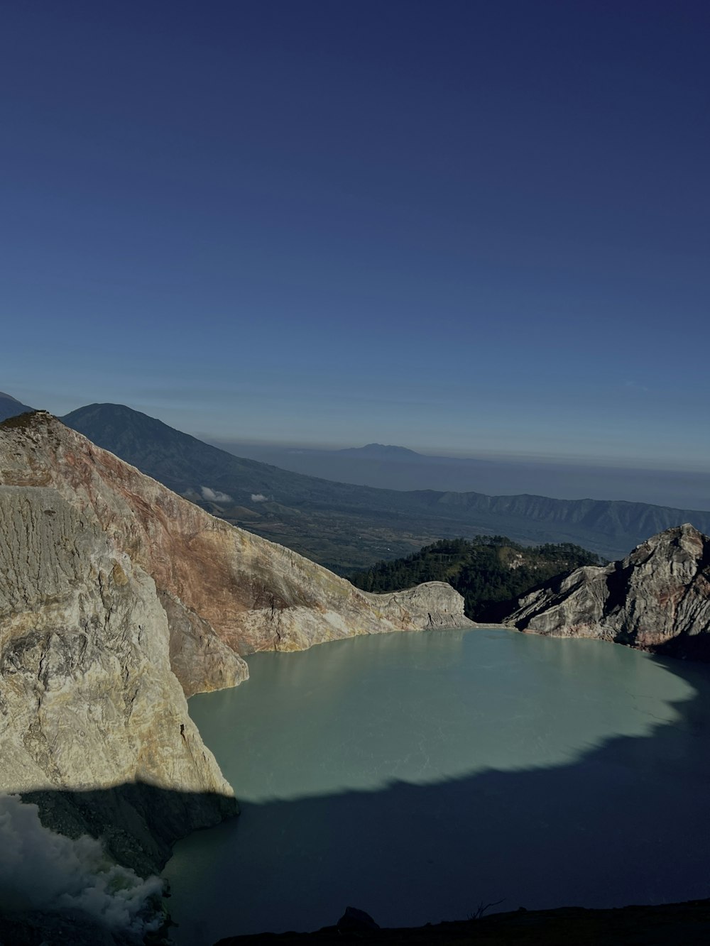 a large body of water surrounded by mountains