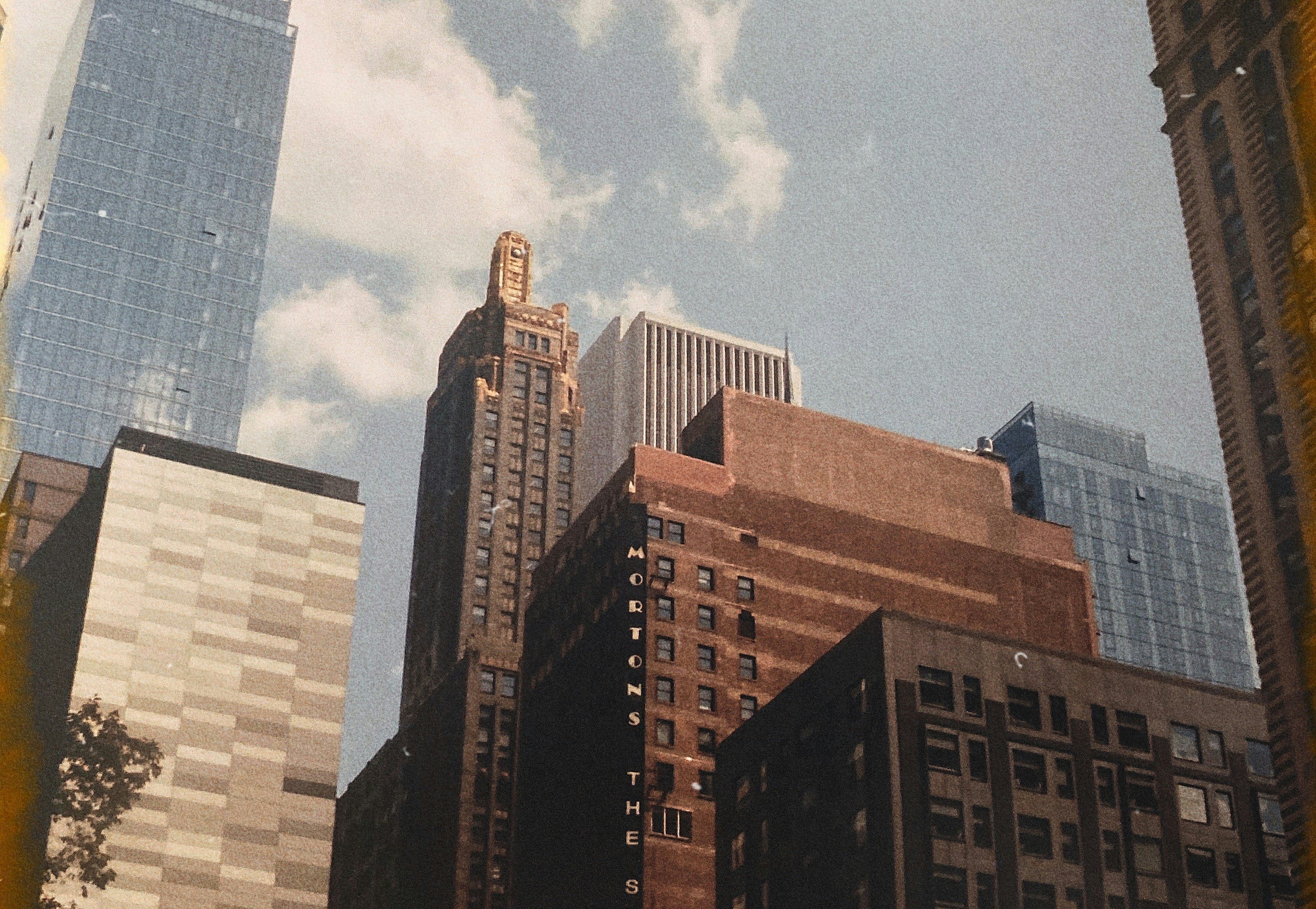a group of tall buildings in a city