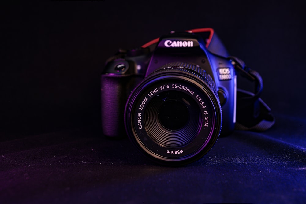 a camera sitting on a table in the dark