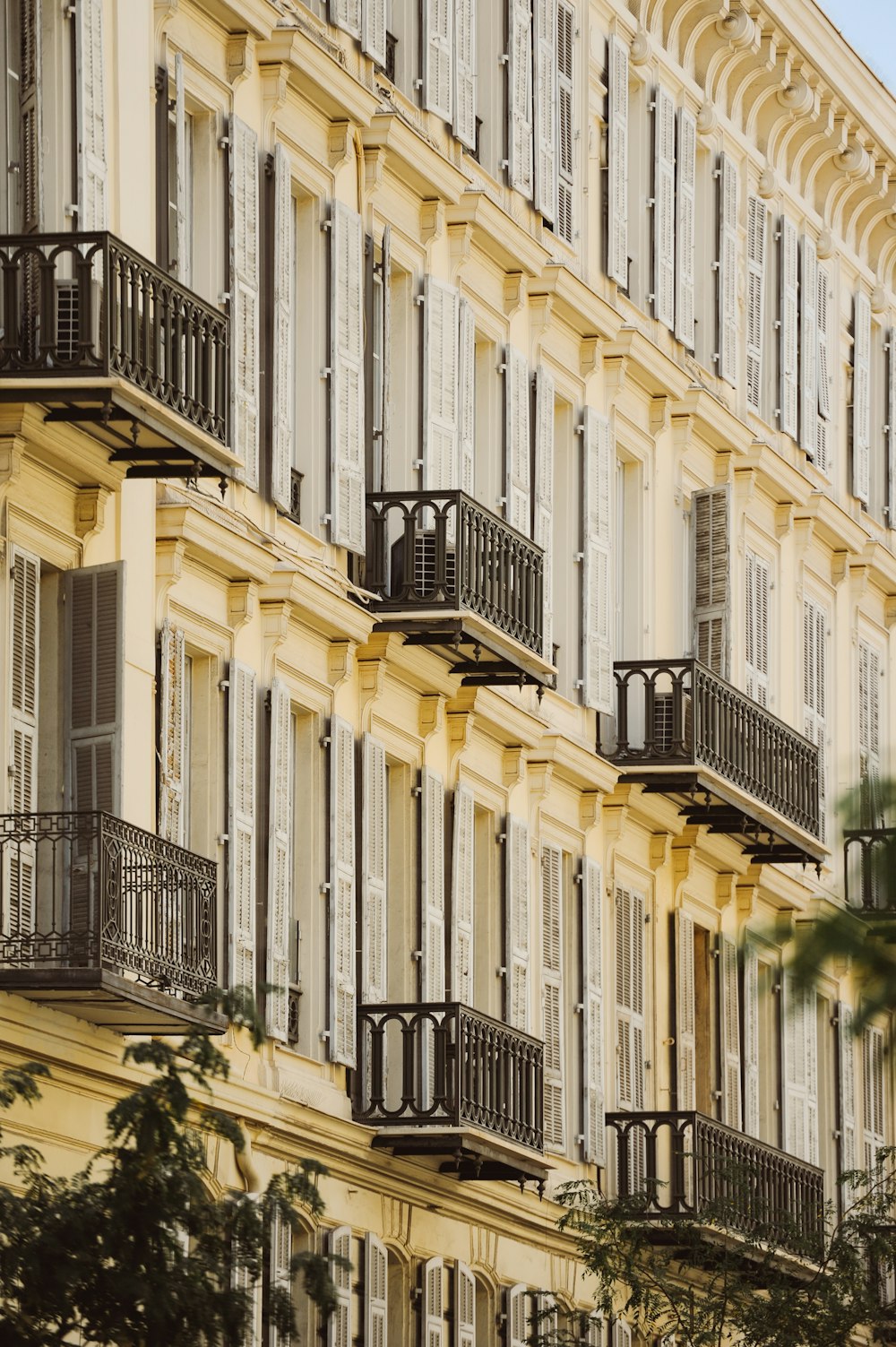 a tall building with balconies and balconies on it