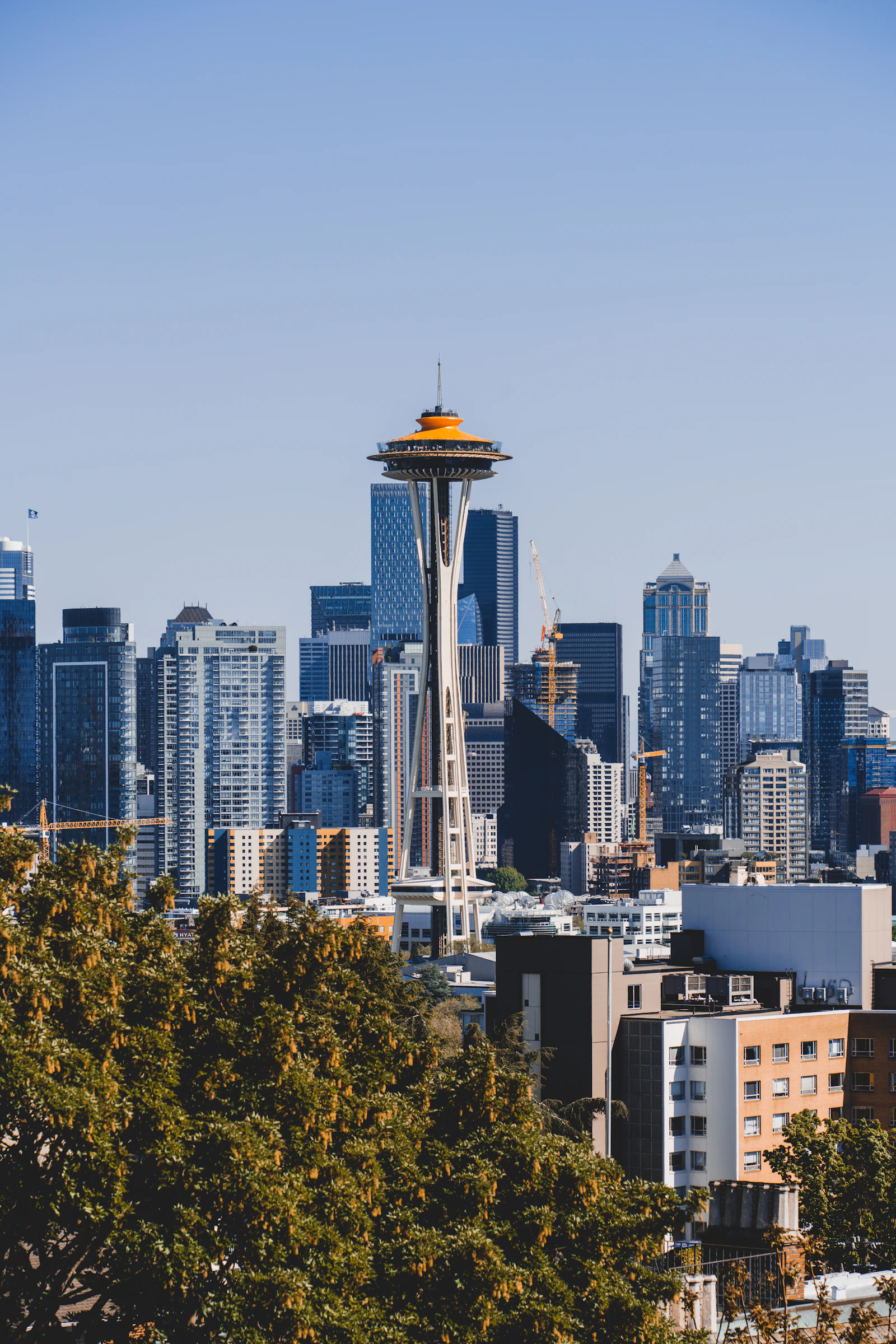 Seattle Space Needle and downtown skyline against a blue sky