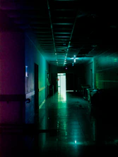 A clean, sanitized medical facility hallway with gleaming floors.