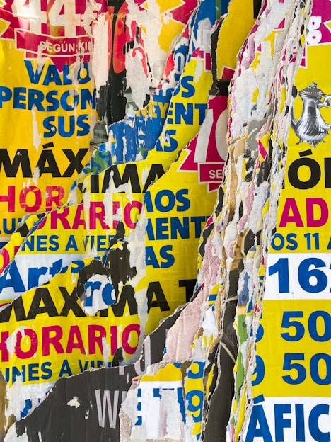 A vibrant collage showing printing materials, mobile phones, and colorful clothing items.