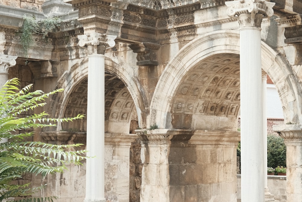 a large stone building with columns and arches