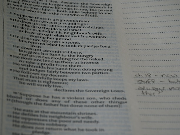 A close-up of a notebook with handwritten notes about spiritual discipline.