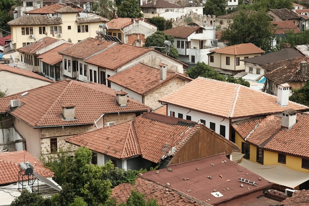 a view of a city with lots of roofs