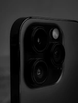 Close-up of a smartphone camera module with technical specs and user ratings overlay.