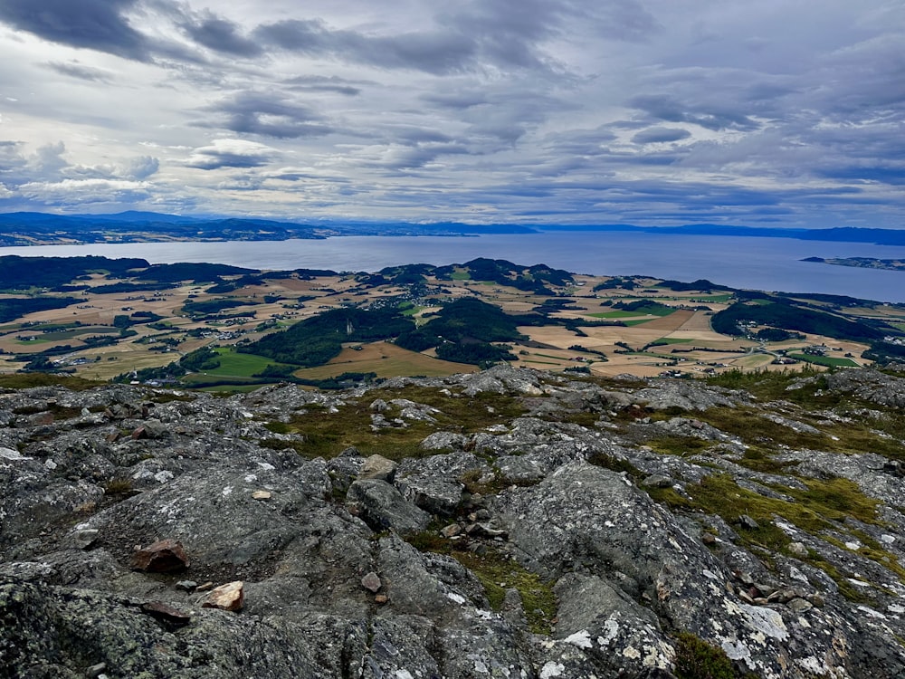 a view of a lake from a mountain top