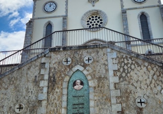 a man is standing in front of a church