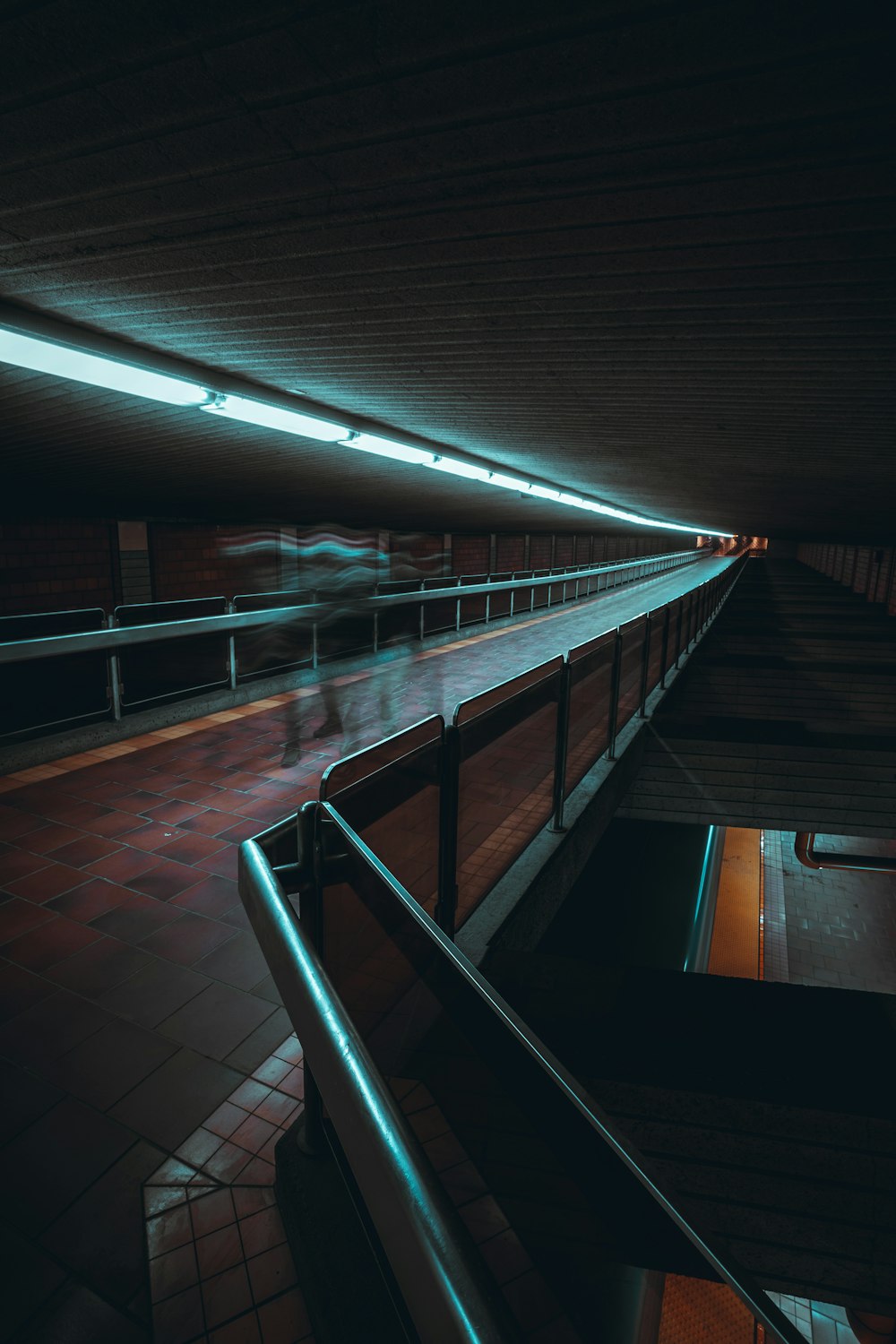 a person riding a skateboard down a ramp