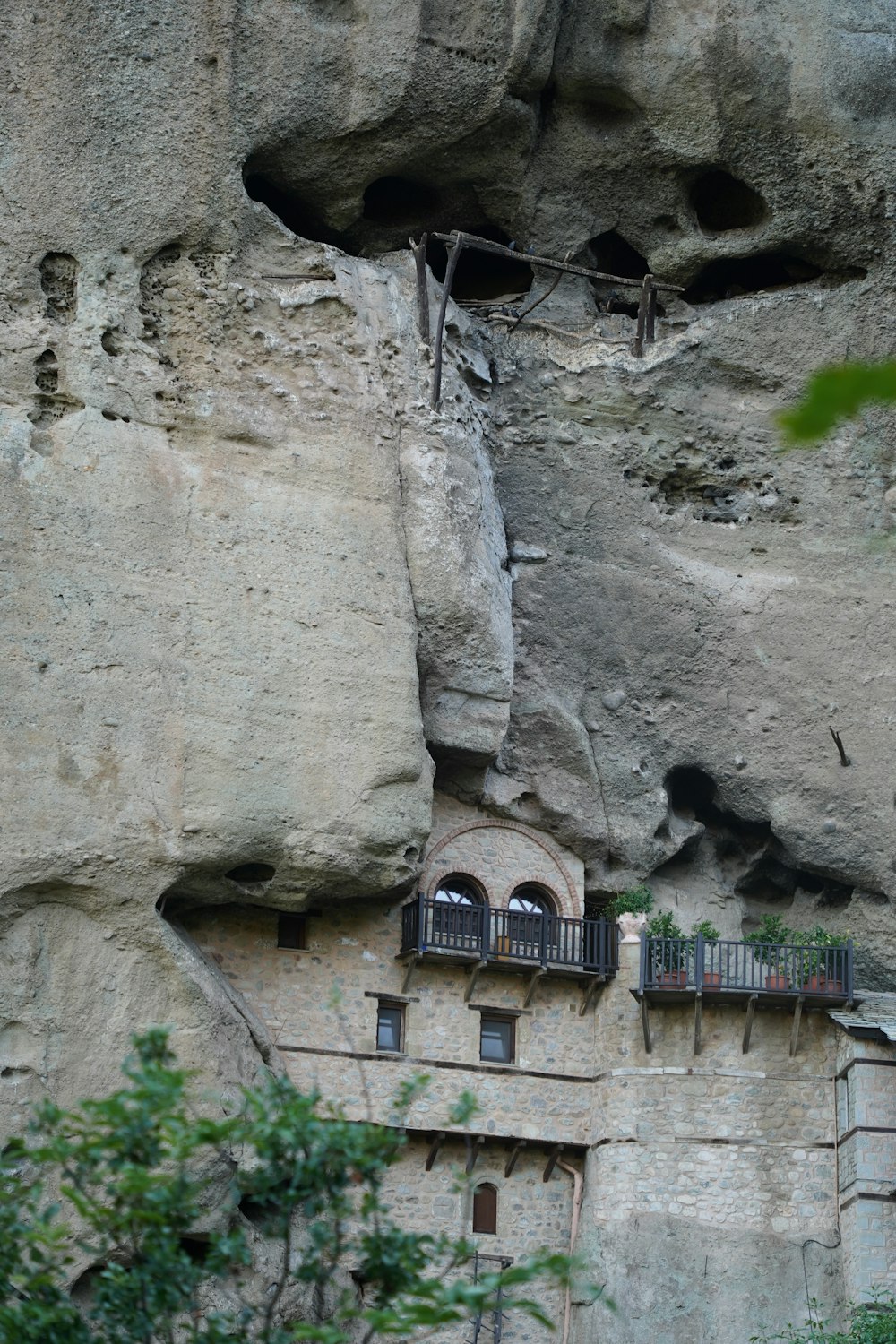 a building built into the side of a cliff