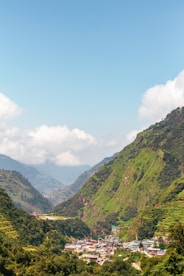 a view of a valley in the mountains