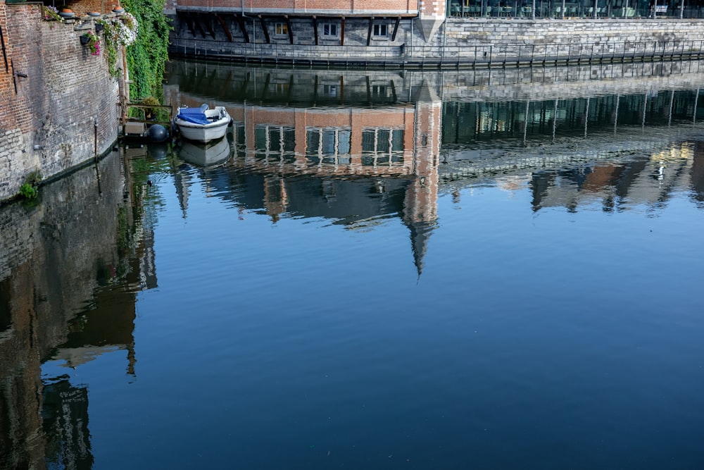 a boat floating on top of a body of water