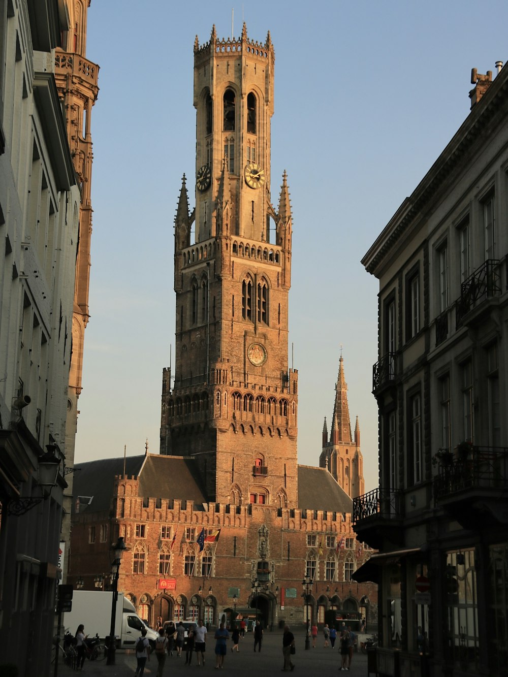 a tall building with a clock on it's side