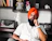 a man with a turban sitting in a chair