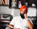 a man with a turban sitting in a chair