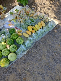 Freshly harvested agro products laid out on a natural fabric.