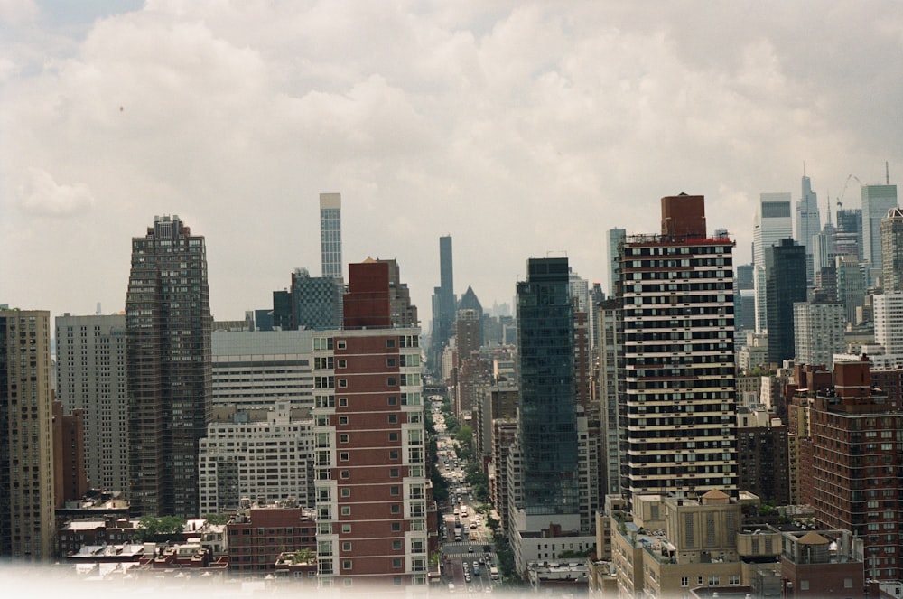 a view of a city with tall buildings