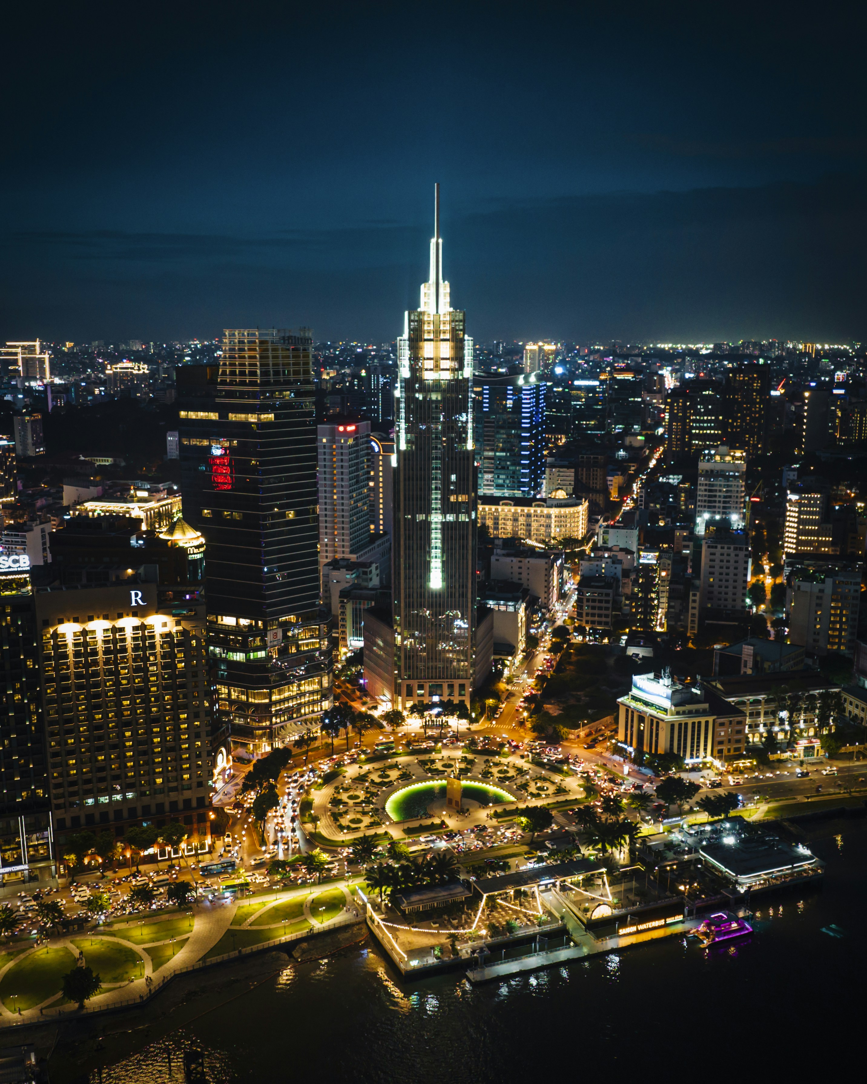 a view of a city at night from the top of a building