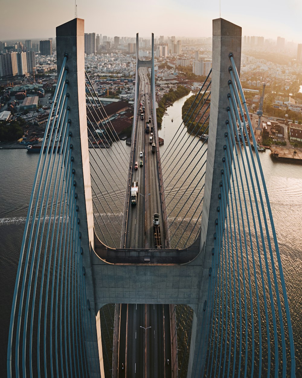 an aerial view of a bridge with cars on it