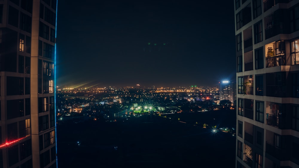 a view of a city at night from a tall building