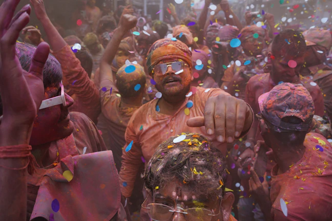 A colorful aqua dance party with joyful attendees splashing and dancing.