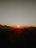 A breathtaking sunset over a scenic viewpoint.