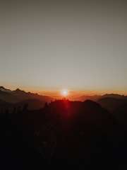 A breathtaking view of a scenic landscape showcasing a beautiful sunset.