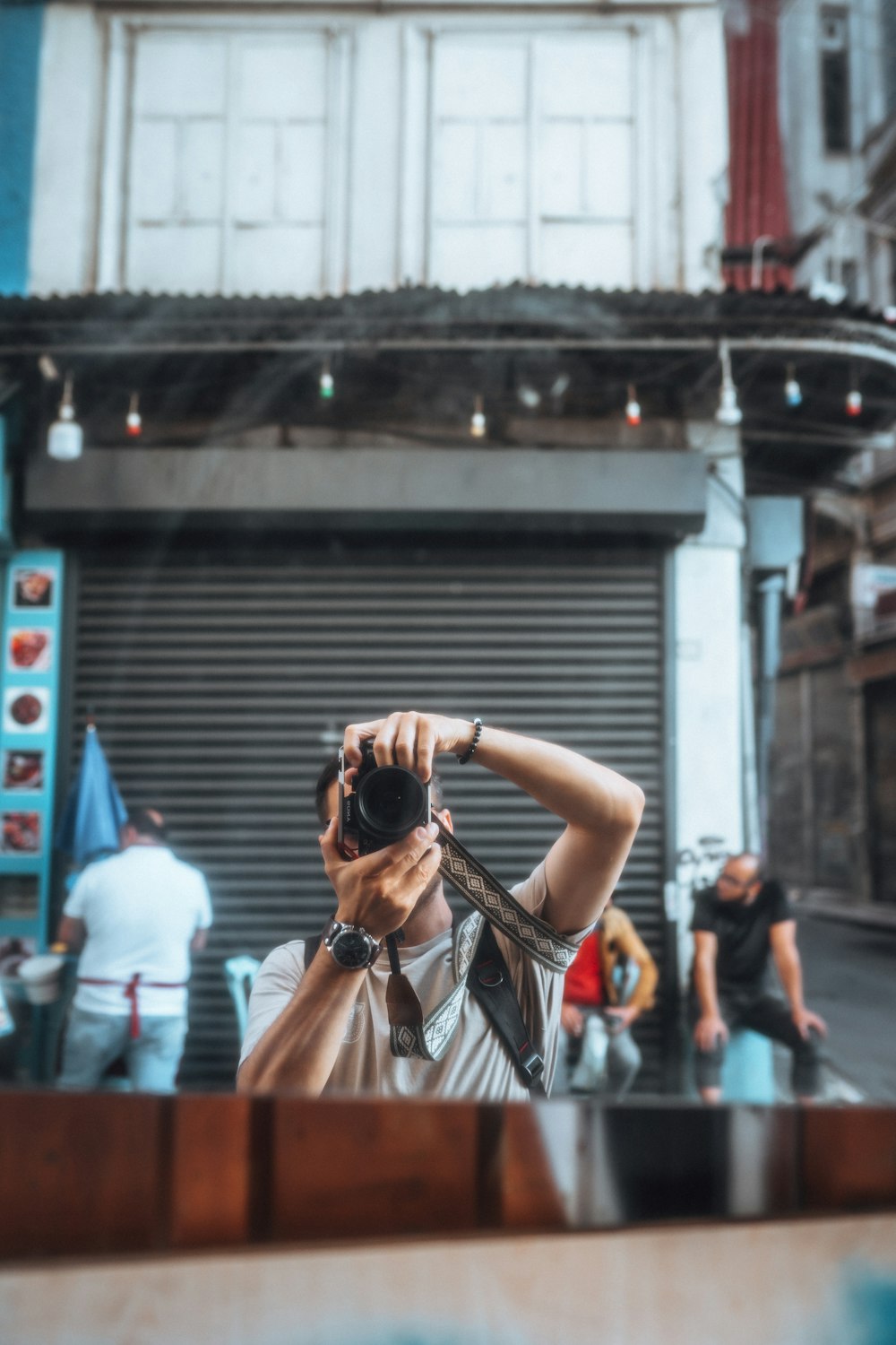 a man taking a picture of himself with a camera