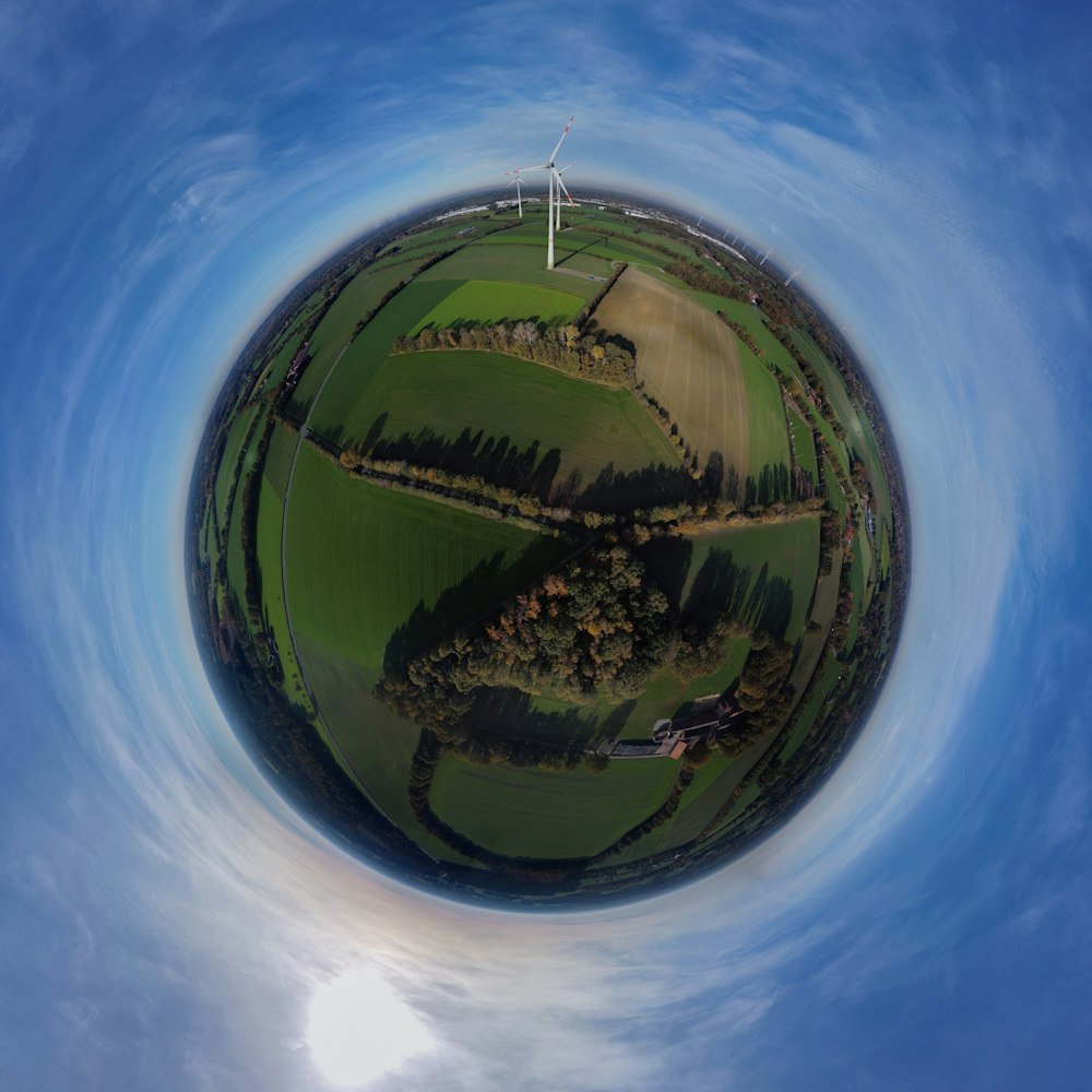 a view of a green field from the air