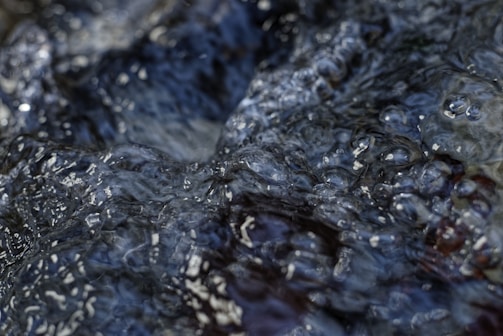 Close-up of a fluid dynamics simulation with colorful flow lines.