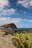 a beach with a mountain in the background
