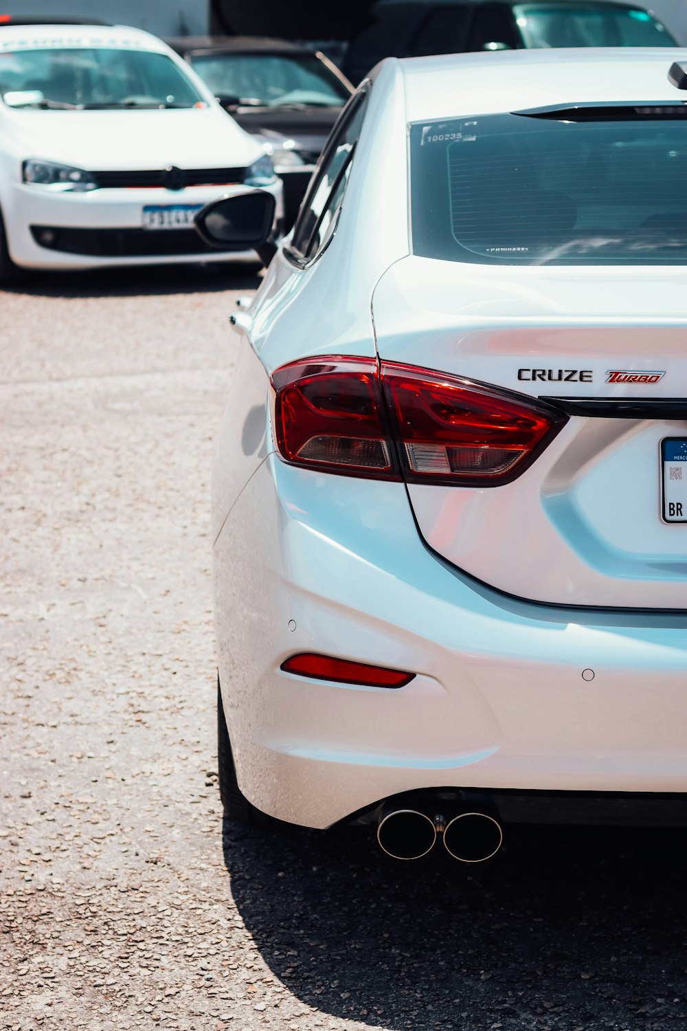 a white car parked in a parking lot